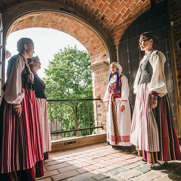 Singing Heritage Route Lithuanian singers Lithuanian women standing in the castles balkony