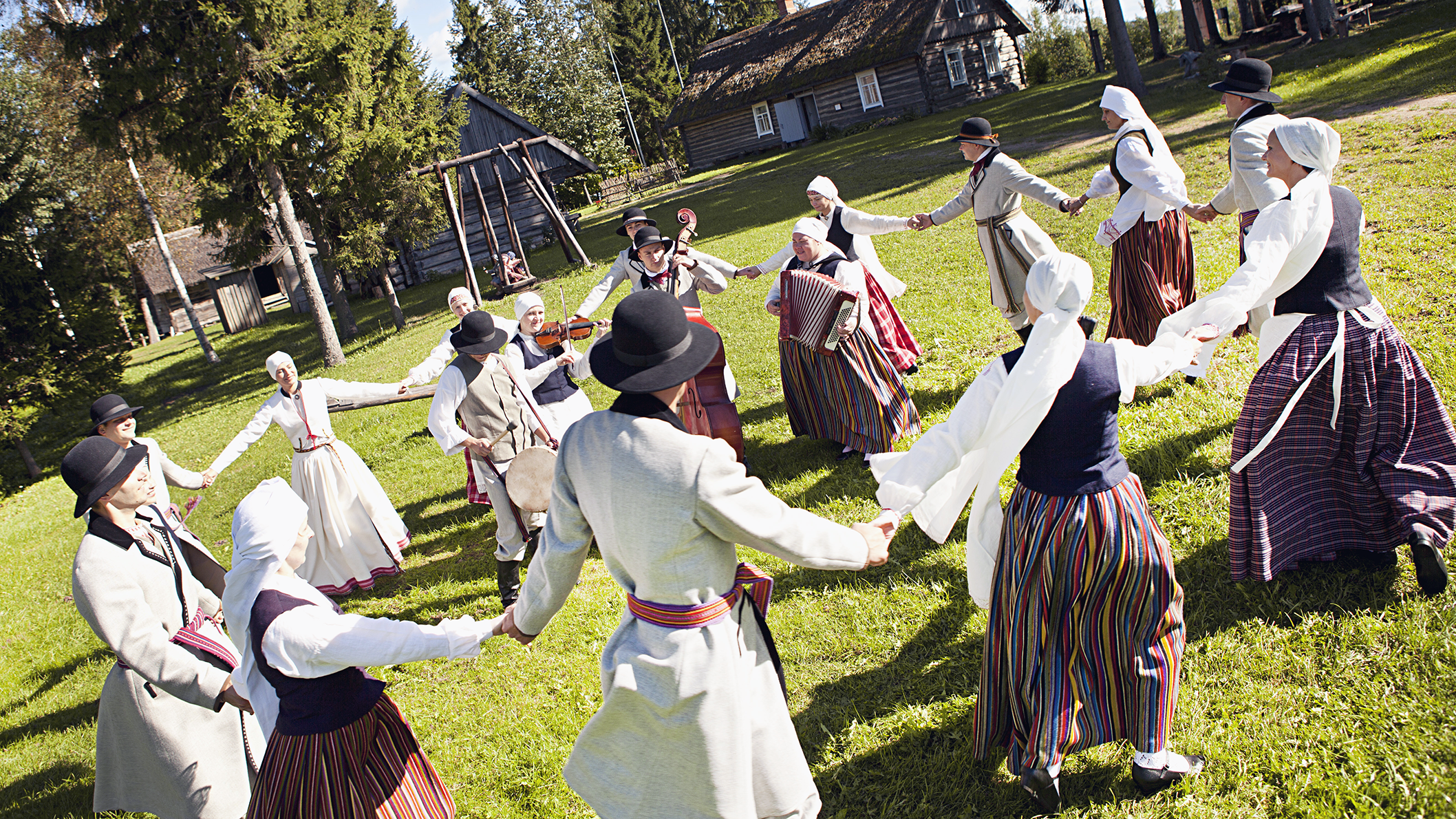 Latvian traditional dancers in  circle