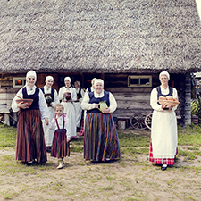 Latvian women in traditional costumes
